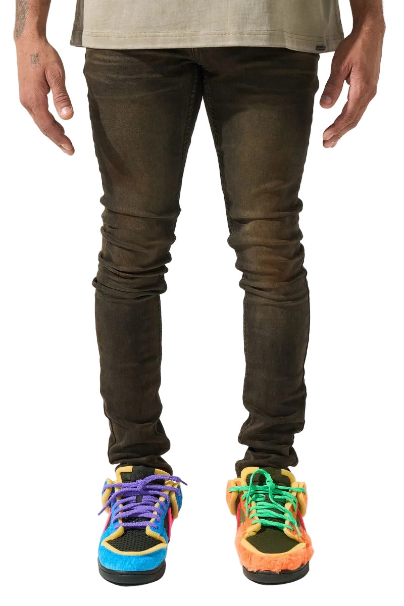 SERENEDE® Cortado fitted jeans in espresso brown denim with subtle fading, elongated inseam, and branded detailing.