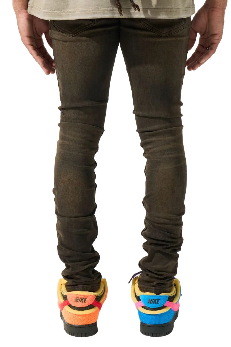 SERENEDE® Cortado fitted jeans in espresso brown denim with subtle fading, elongated inseam, and branded detailing.