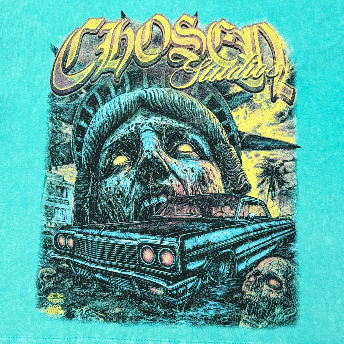 CHOSEN Doomsday Tee in turquoise with bold graphic design and classic short sleeve fit