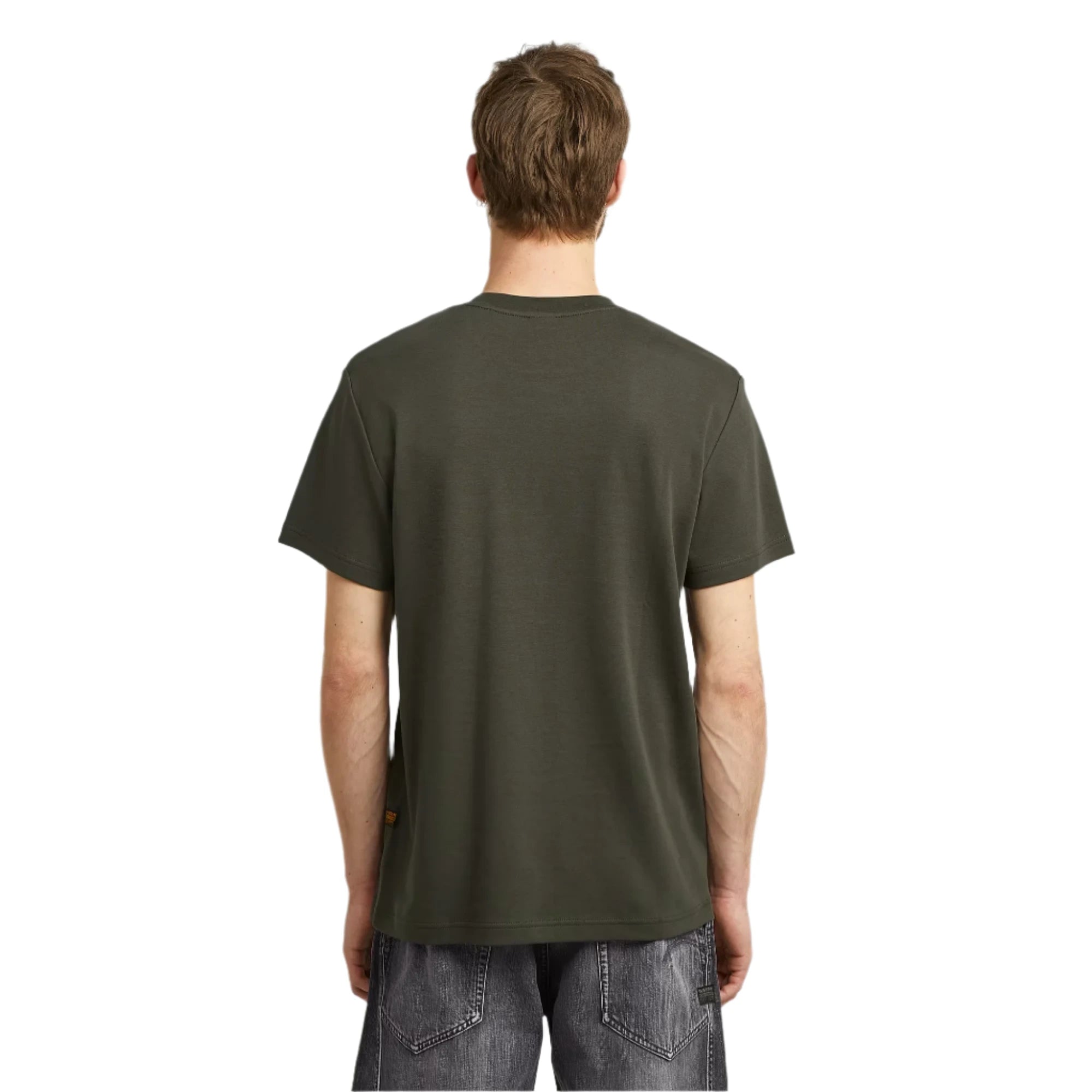 Person wearing a green t-shirt on a plain background