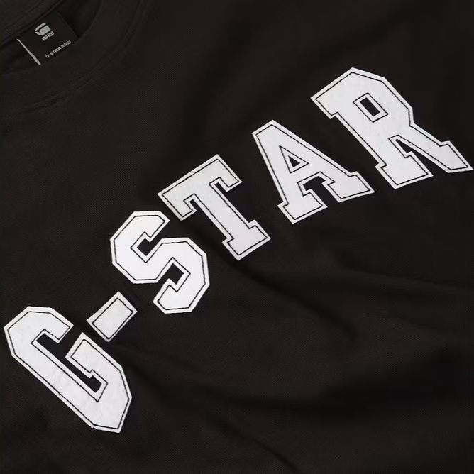 Black t-shirt with 'G-STAR' text on a light gray background