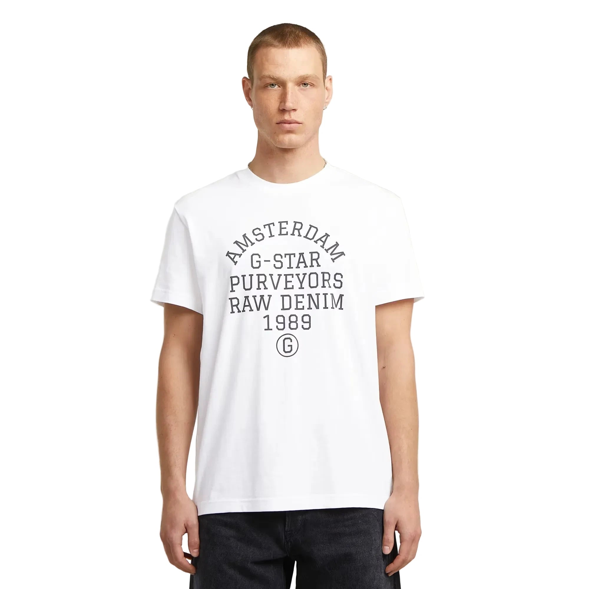 Purveyors T-shirt in white with a round neck and graphic print on the front.