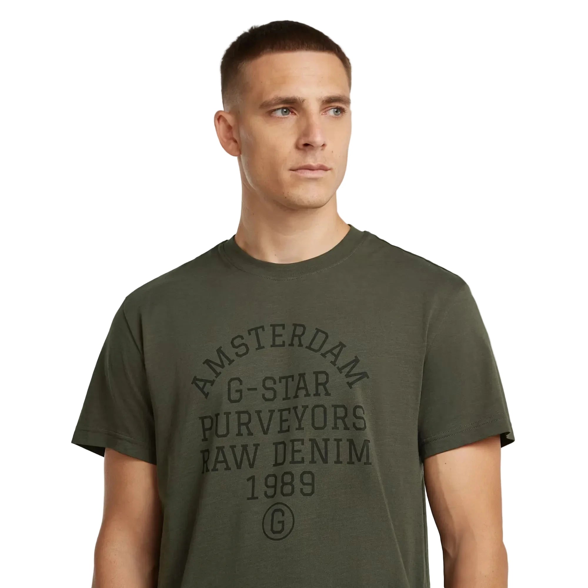 Purveyors T-shirt in asfalt color with a round neck and graphic detail on the front.