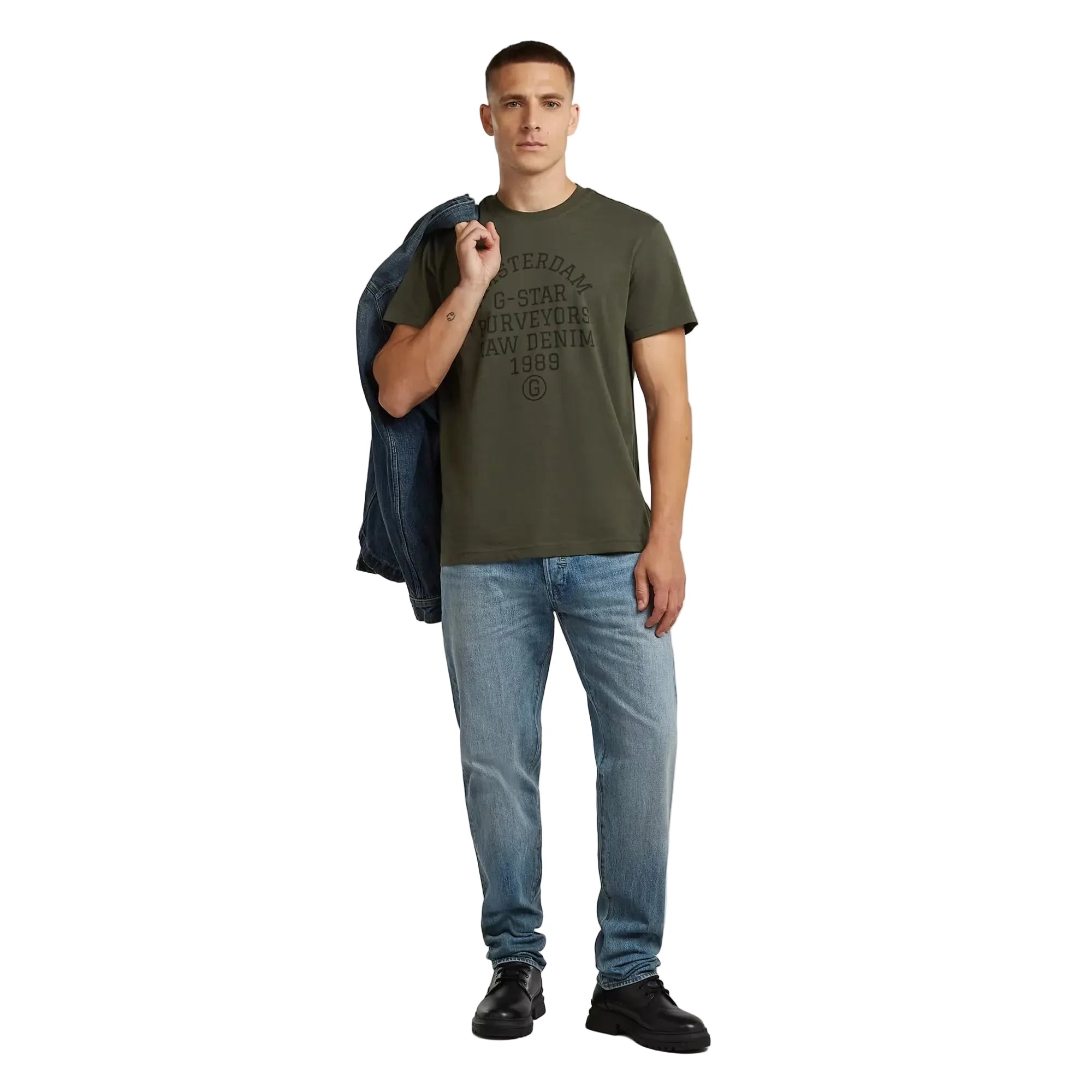 Purveyors T-shirt in asfalt color with a round neck and graphic detail on the front.