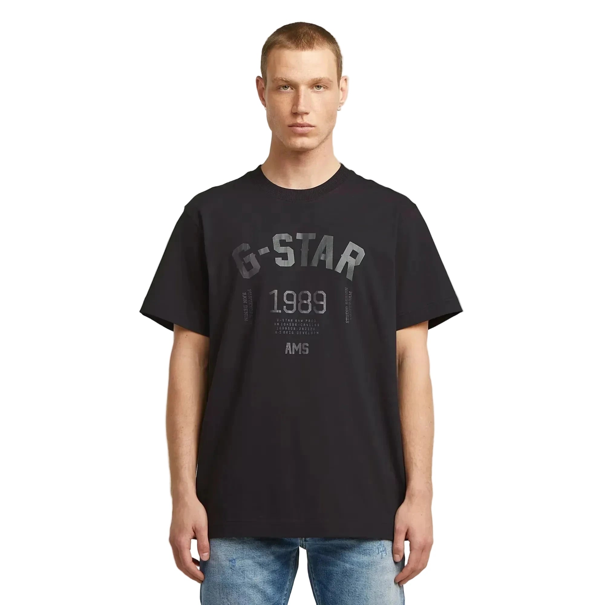 89 Back Graphic Loose T-shirt in dark black with graphic prints on the front and back.