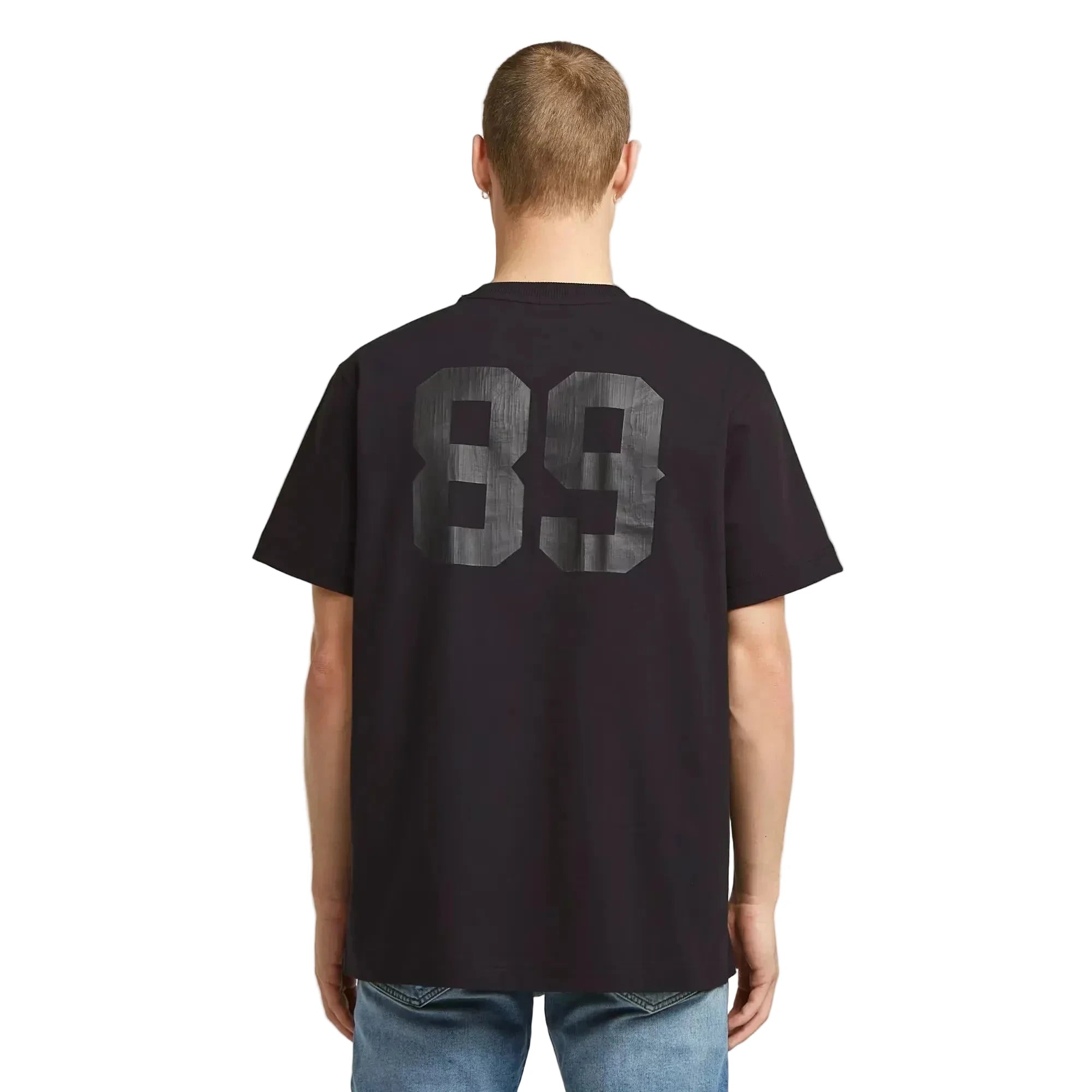 89 Back Graphic Loose T-shirt in dark black with graphic prints on the front and back.