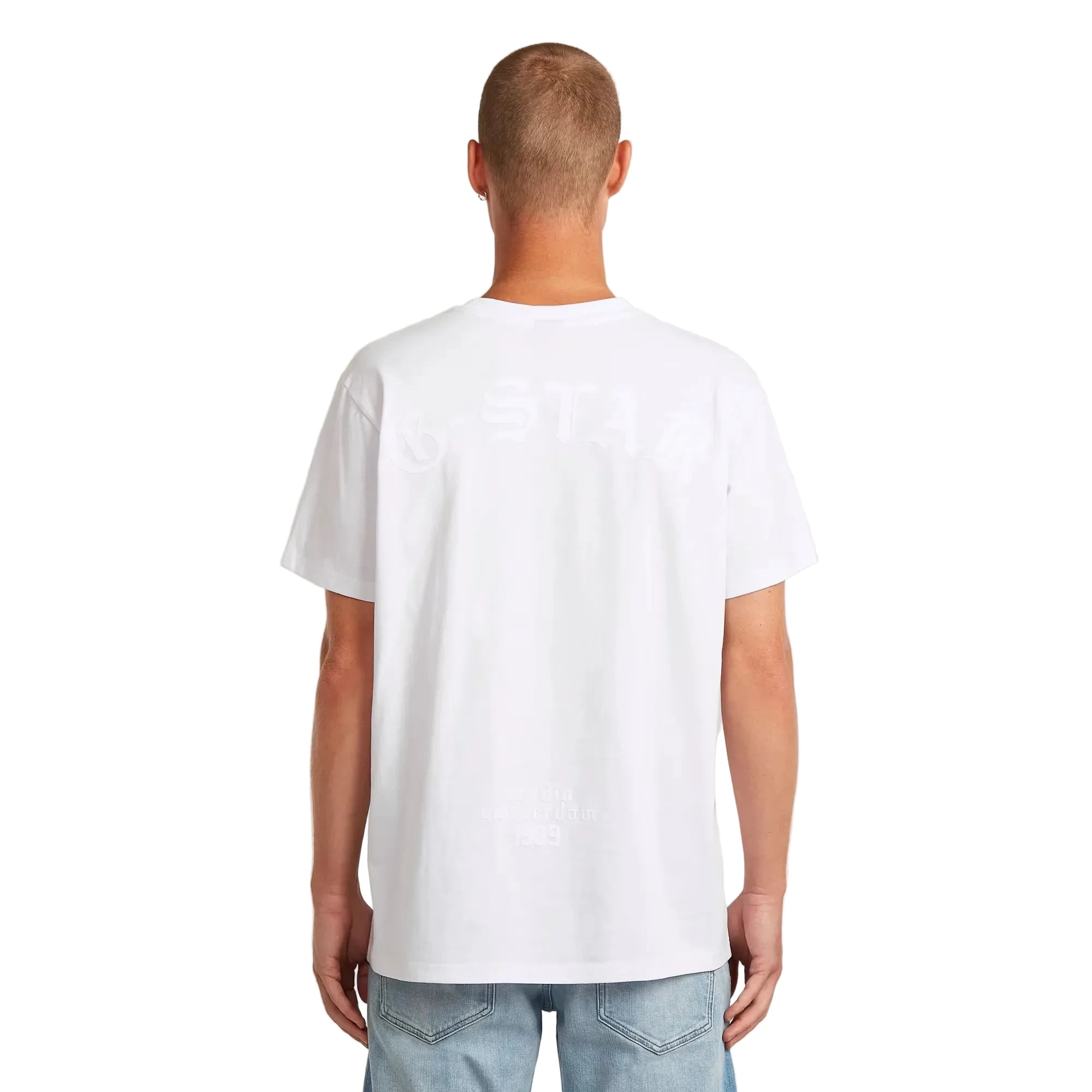 Flock Back Loose T-shirt in white with a bold graphic design on the back.