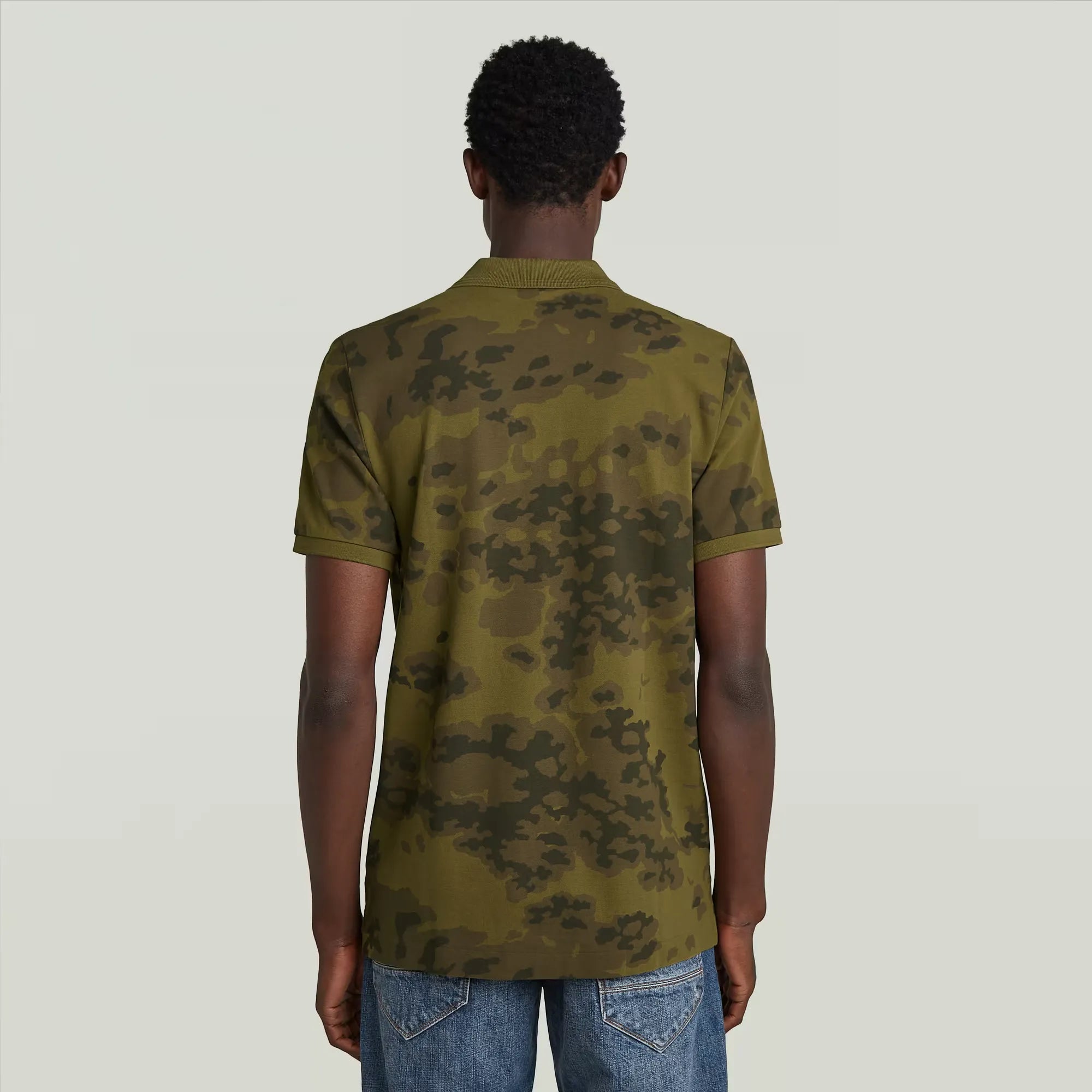 Dunda Slim Allover Polo with slim fit, short sleeves, and allover design