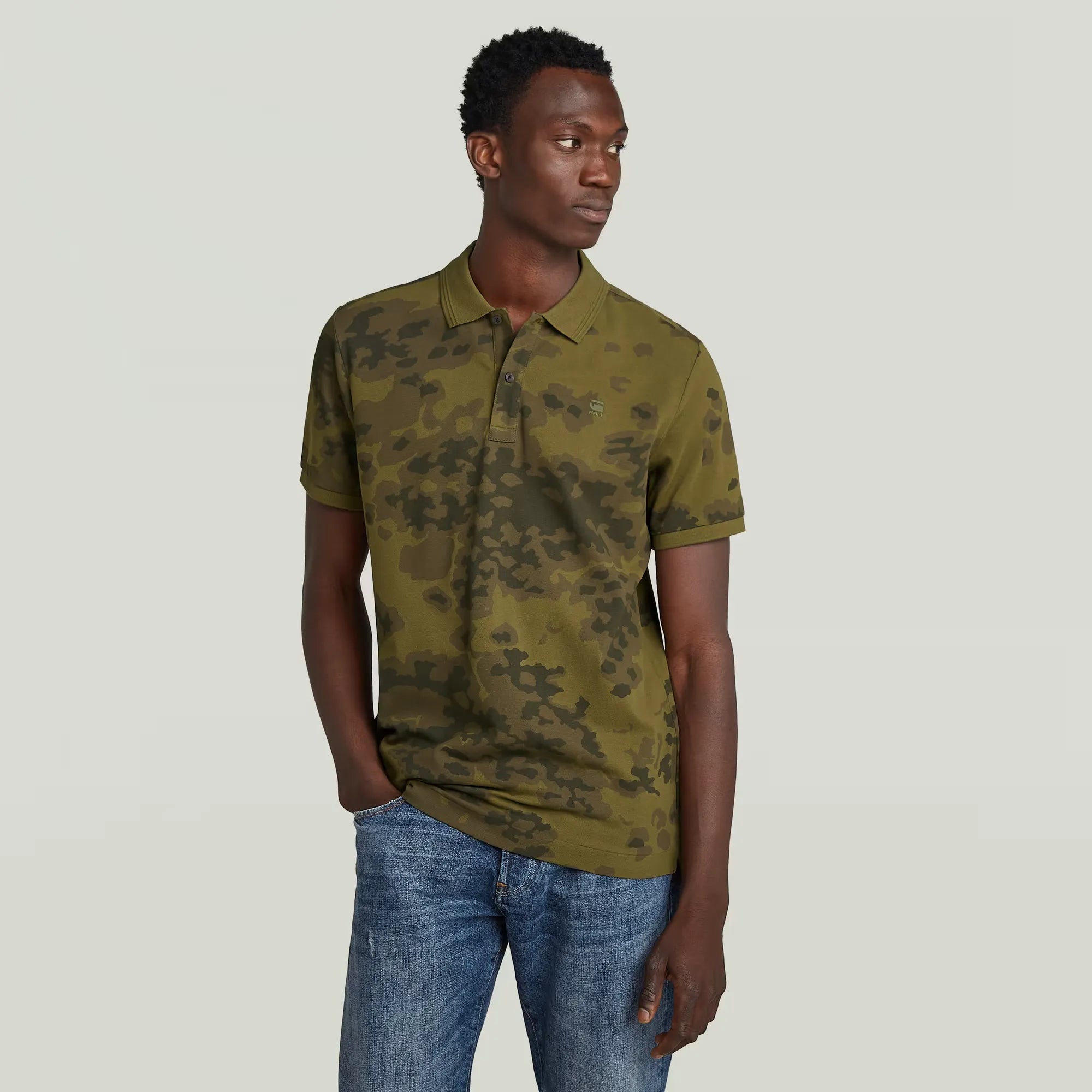 Dunda Slim Allover Polo with slim fit, short sleeves, and allover design