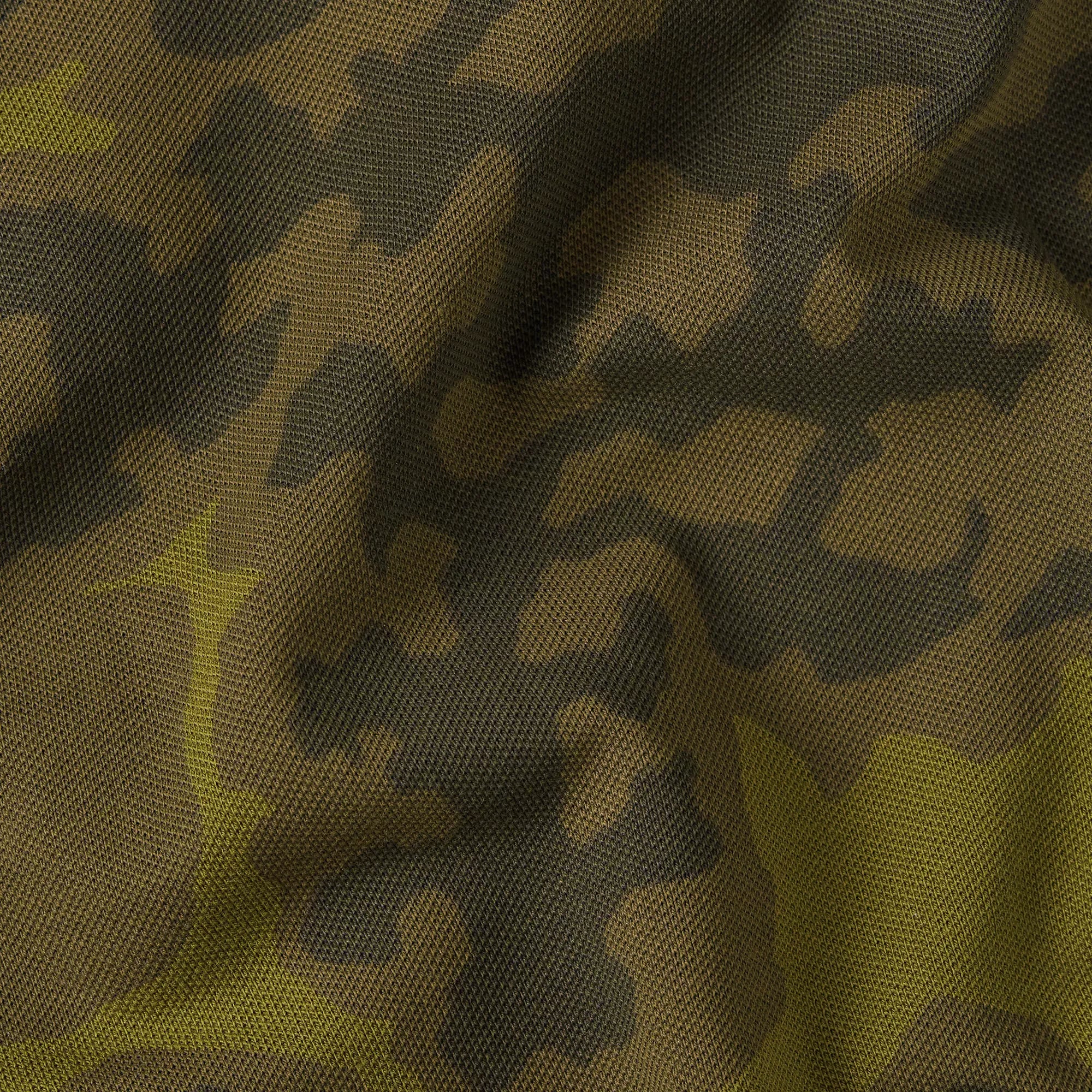 Dunda Slim Allover Polo with slim fit, short sleeves, and allover design