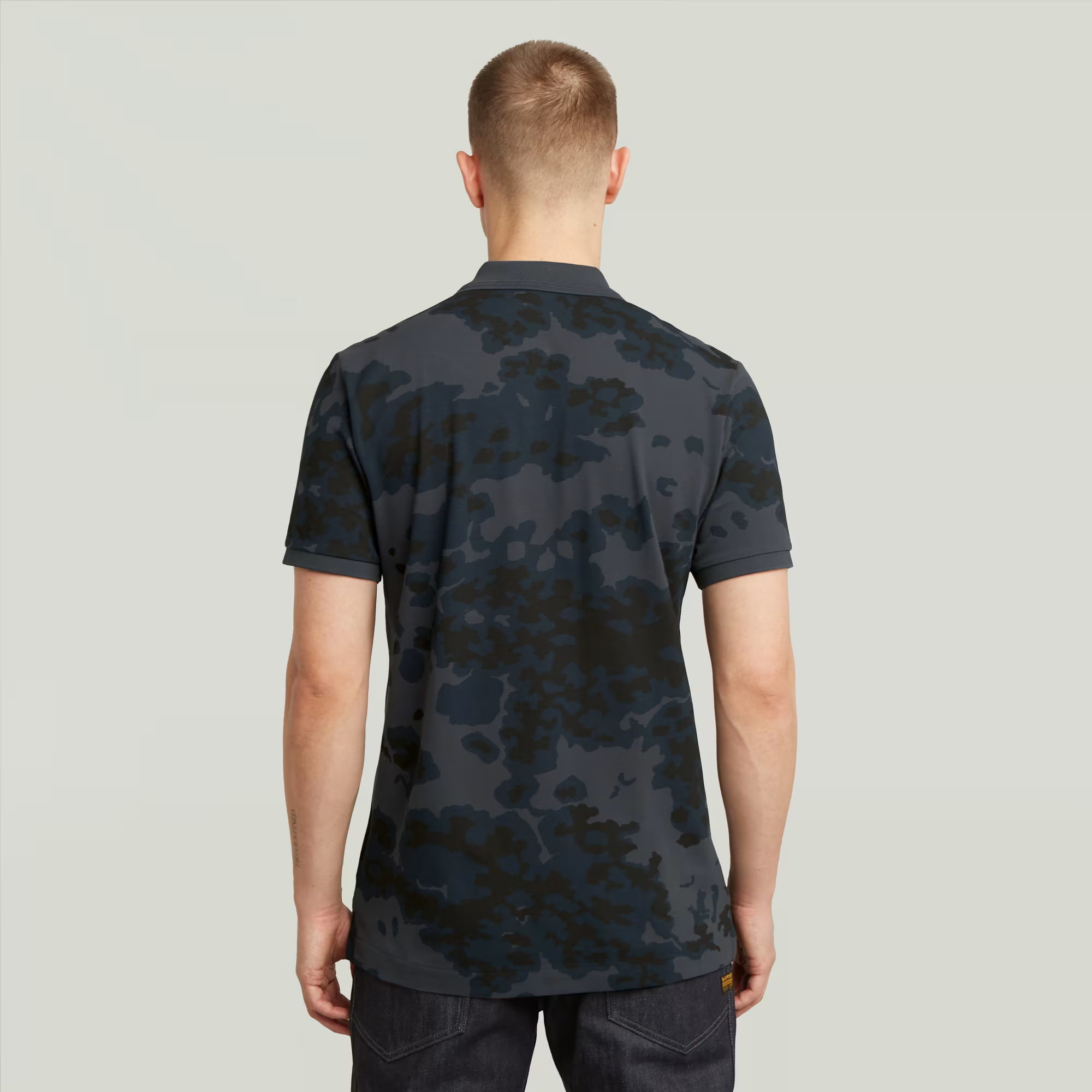 G-STAR® Dunda Slim Allover Polo in India Ink Forest Camo with graphic print and polo collar