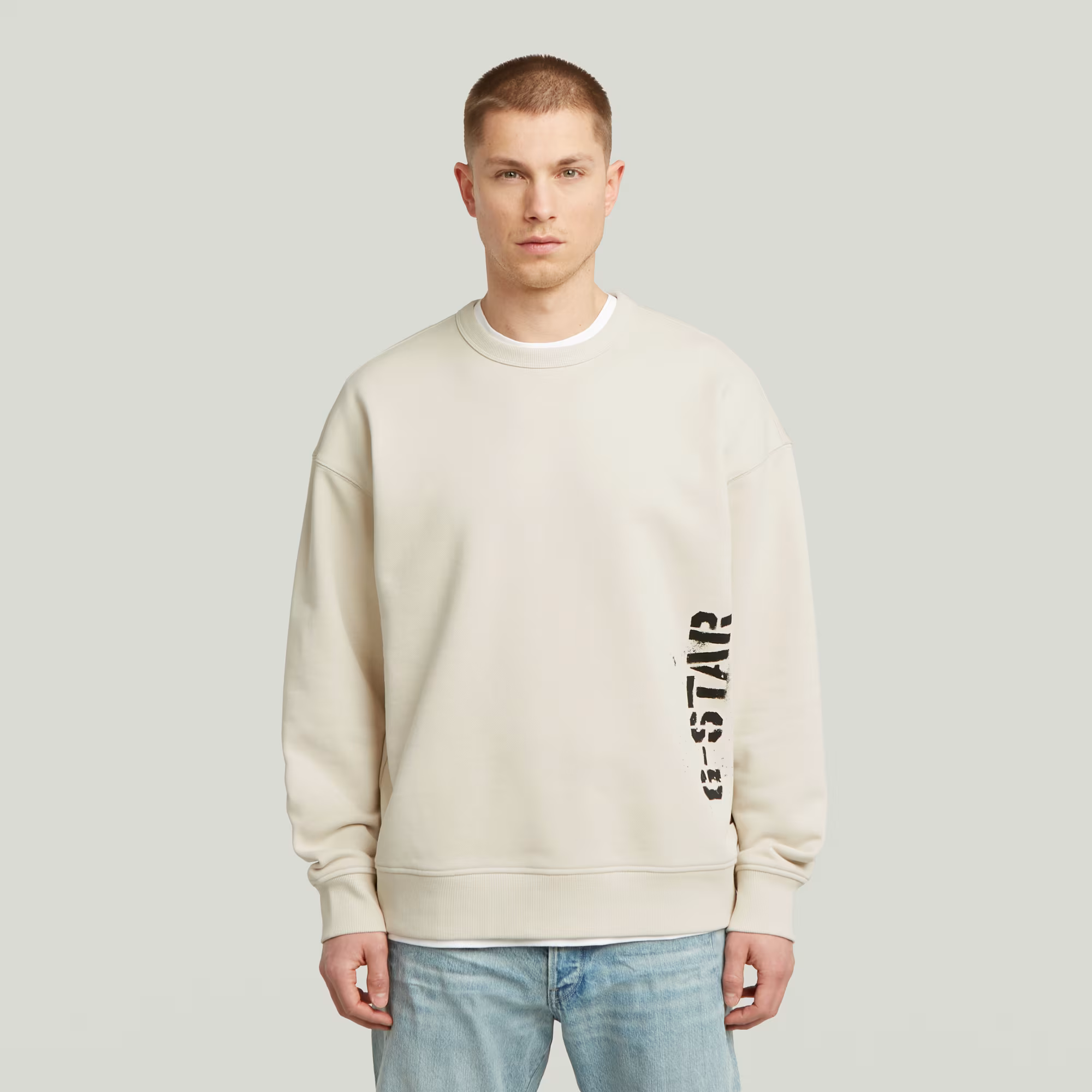 Sprayed 89 Graphic Loose Sweater in White Bait with round neck, long sleeves, and graphic print