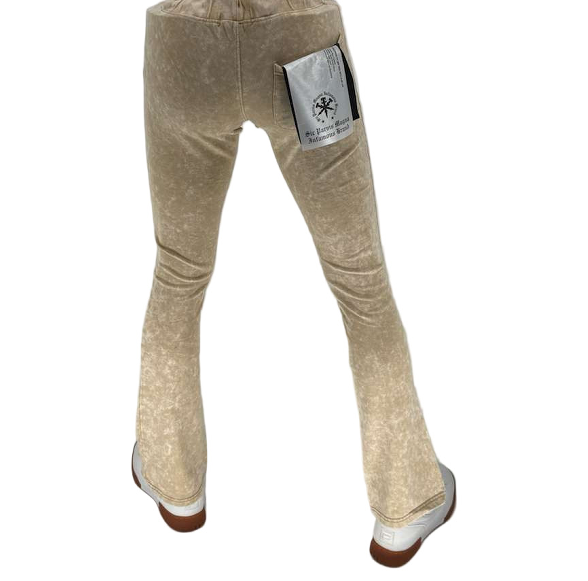 Beige bell-bottom pants with a brand label on a white background
