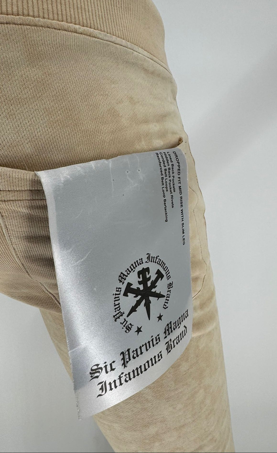 The INFAMOUS BRAND Basic Tie Dye Stack Sweatpant (Khaki) combines comfort and street-ready style