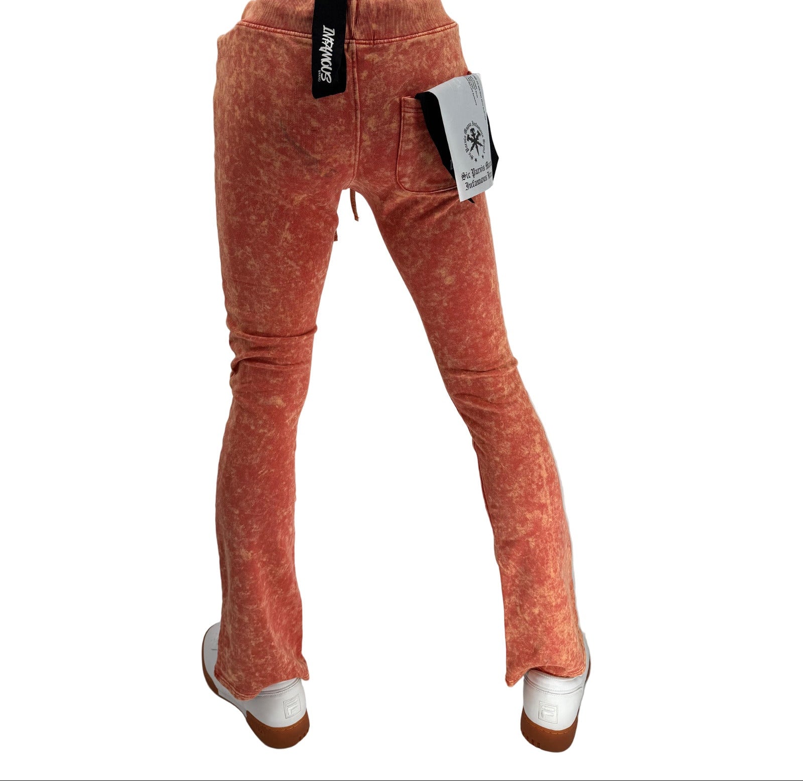 Turn up the energy in your wardrobe with the Basic Tie Dye Stack Sweatpant in Orange, where comfort meets bold streetwear design. Made from ultra-soft premium cotton-blend fleece, these sweatpants feature a stacked fit and vibrant hand-dyed orange tie-dye pattern, giving every pair its own unique edge.