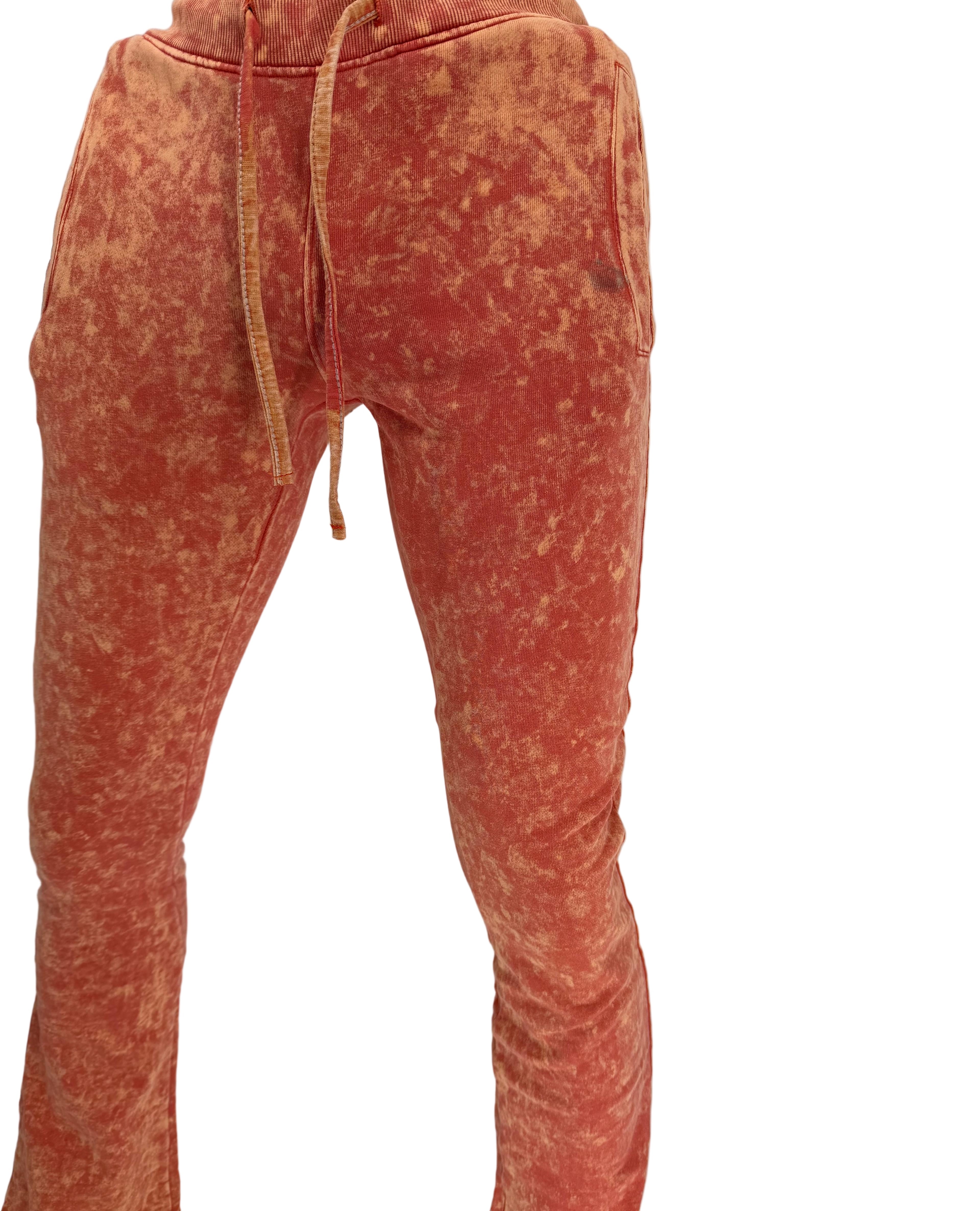 Turn up the energy in your wardrobe with the Basic Tie Dye Stack Sweatpant in Orange, where comfort meets bold streetwear design. Made from ultra-soft premium cotton-blend fleece, these sweatpants feature a stacked fit and vibrant hand-dyed orange tie-dye pattern, giving every pair its own unique edge.
