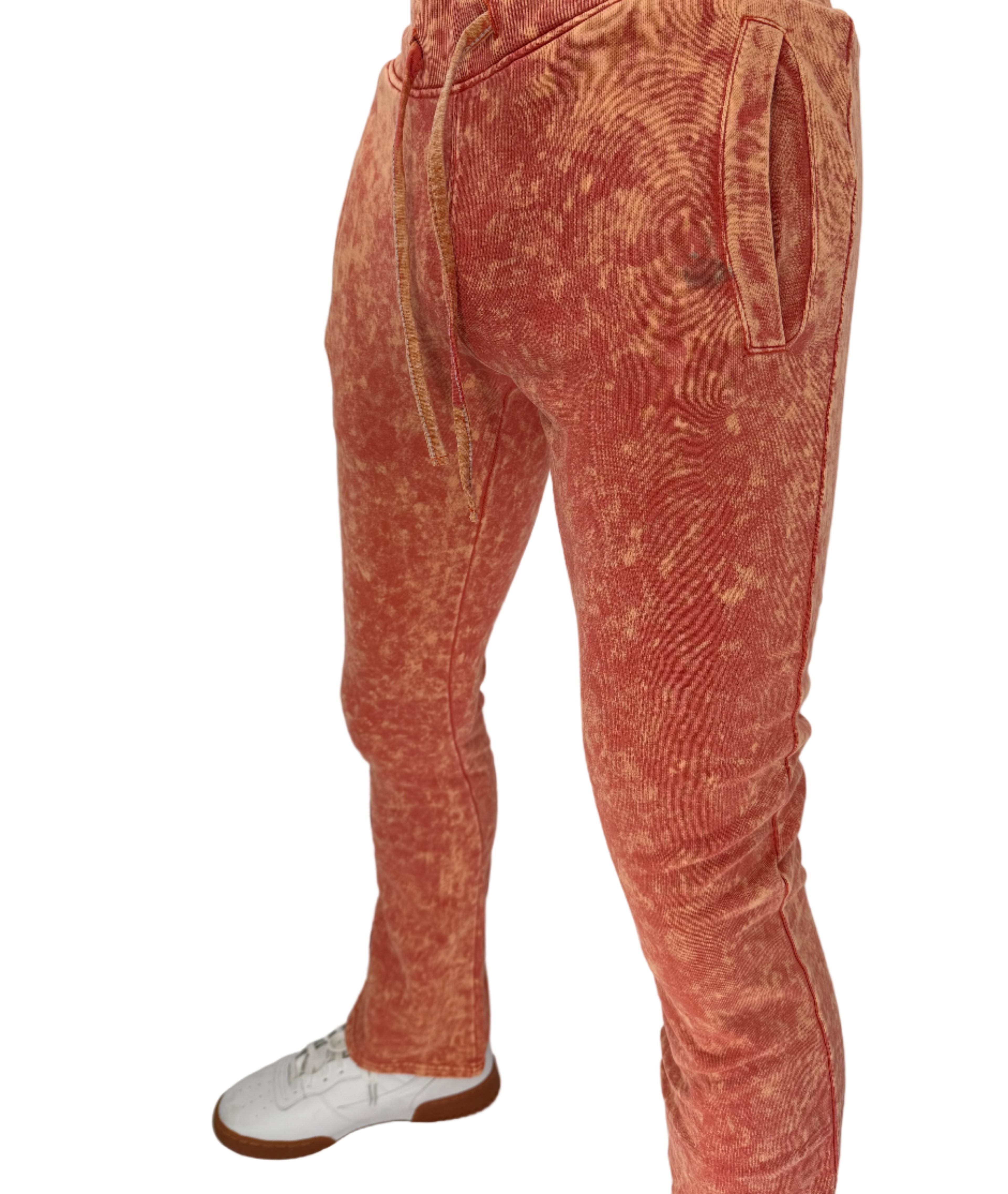 Turn up the energy in your wardrobe with the Basic Tie Dye Stack Sweatpant in Orange, where comfort meets bold streetwear design. Made from ultra-soft premium cotton-blend fleece, these sweatpants feature a stacked fit and vibrant hand-dyed orange tie-dye pattern, giving every pair its own unique edge.