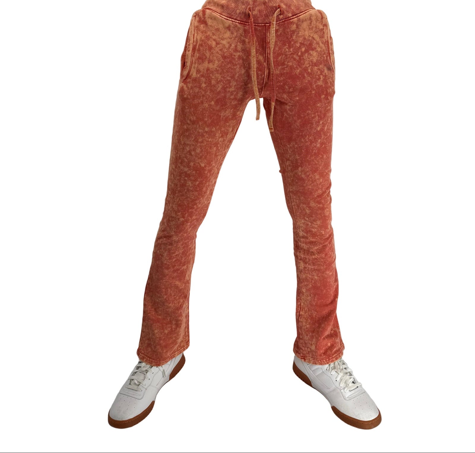 Turn up the energy in your wardrobe with the Basic Tie Dye Stack Sweatpant in Orange, where comfort meets bold streetwear design. Made from ultra-soft premium cotton-blend fleece, these sweatpants feature a stacked fit and vibrant hand-dyed orange tie-dye pattern, giving every pair its own unique edge.