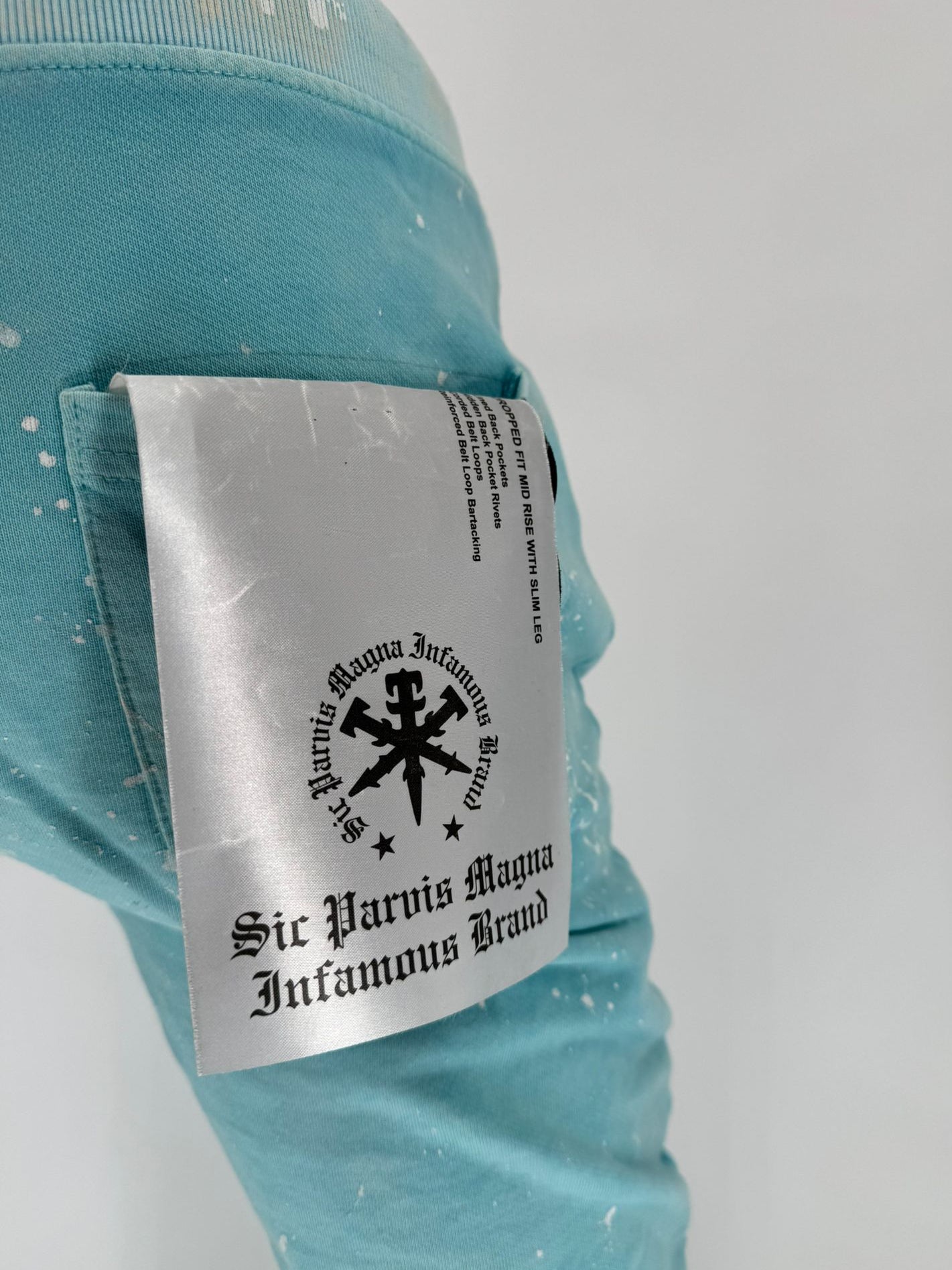 The INFAMOUS Basic Tie Dye Stack Sweatpant (Tiffany Blue) brings bold color and stacked-leg style together in a standout casual piece.