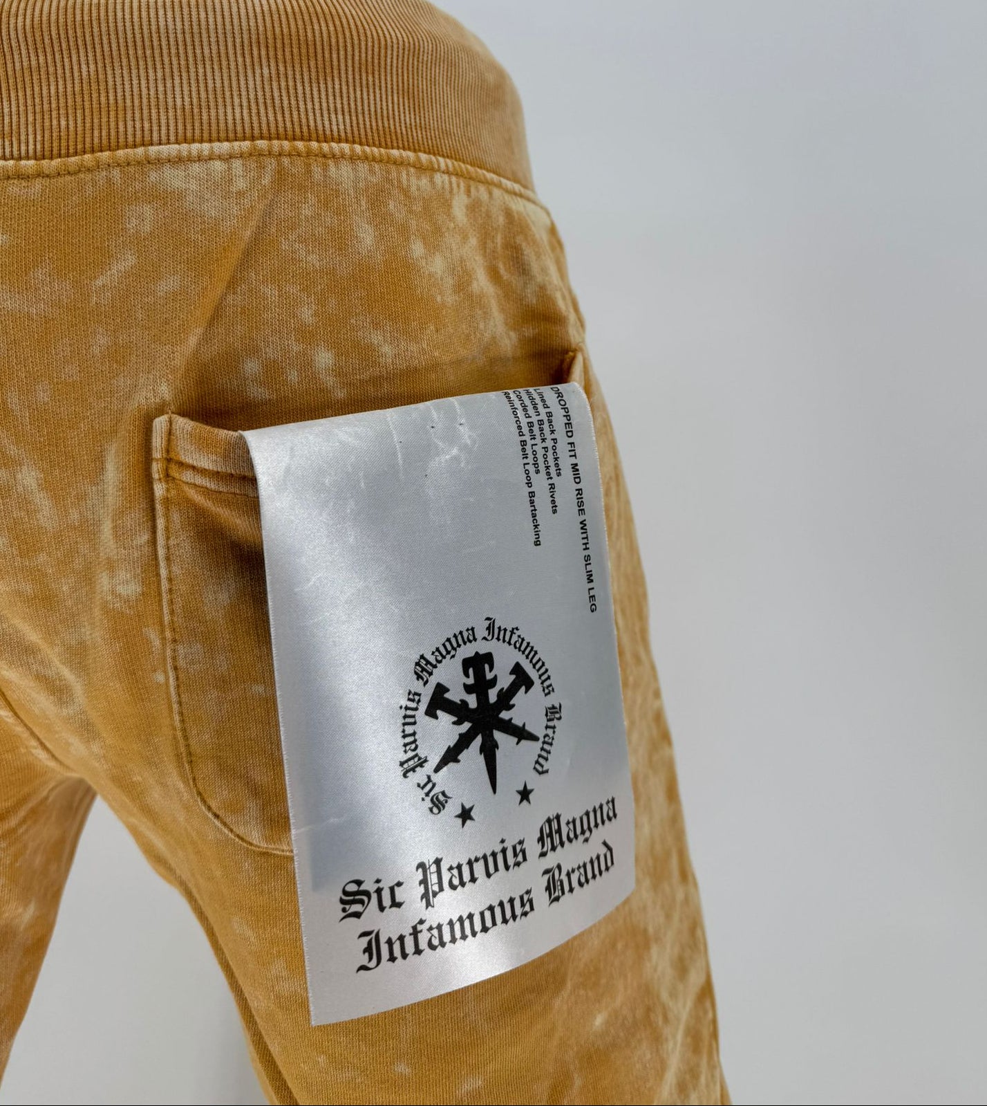 The INFAMOUS Basic Tie Dye Stack Sweatpant (Timber) delivers laid-back comfort with a bold stacked-leg silhouette.