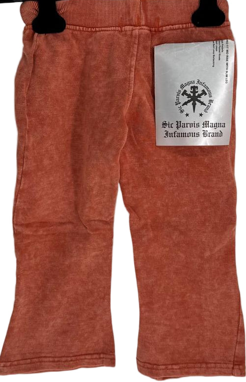 Brighten up your kid’s wardrobe with our Kids Tie Dye Stacked Pants in Orange — a perfect blend of comfort and cool streetwear style.