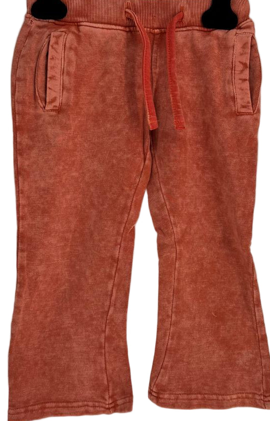 Brighten up your kid’s wardrobe with our Kids Tie Dye Stacked Pants in Orange — a perfect blend of comfort and cool streetwear style.