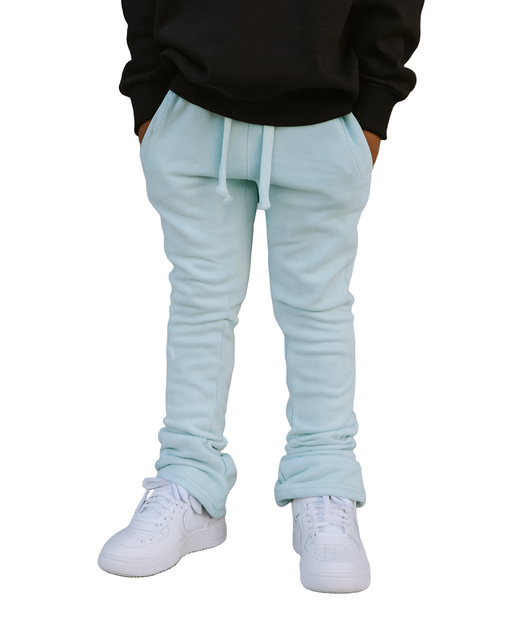 Bring vibrant street style to your kid’s wardrobe with our Kids Tie Dye Stacked Pants in Tiffany Blue