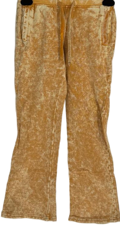 Add warm, earthy tones to your kid’s wardrobe with our Kids Tie Dye Stacked Pants in Timber