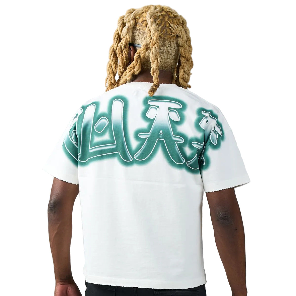 DUAA Bolt Tee in white featuring an airbrushed leopard graphic, teal rhinestone graffiti lettering, and a teal DUAA back print.
