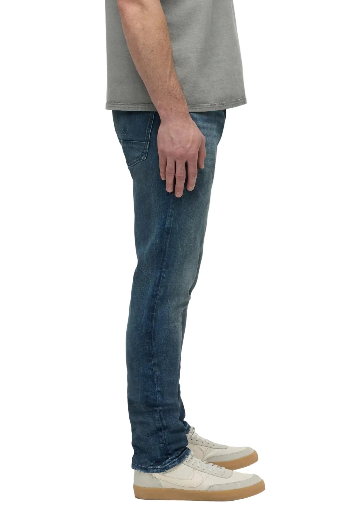 Hudson Zack Skinny Jeans in Western wash with tonal stitching, subtle black spray detailing, and a modern slim-fit silhouette.