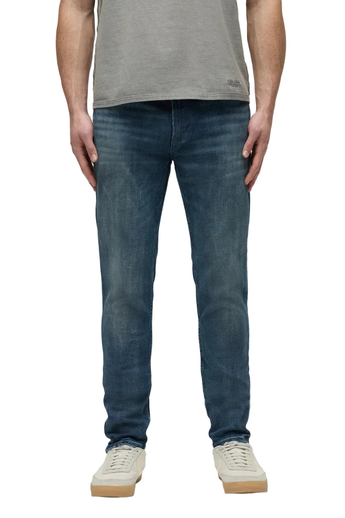 Hudson Zack Skinny Jeans in Western wash with tonal stitching, subtle black spray detailing, and a modern slim-fit silhouette.