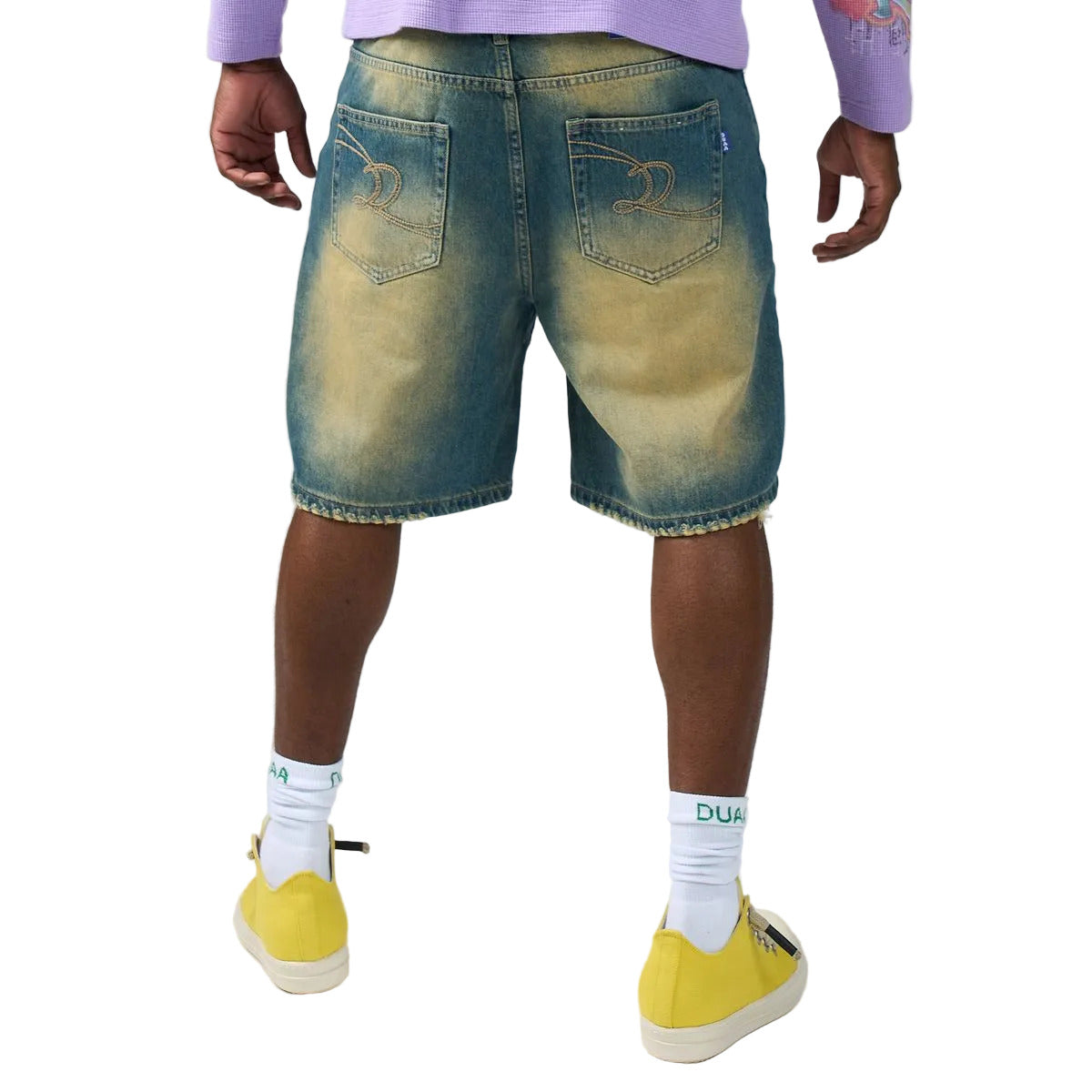 DUAA Wall Blue denim shorts in a vintage blue wash with a yellow tint, featuring a large rhinestone graffiti DUAA design, embroidered back pockets, a raw cutoff hem, and a drawstring waist.