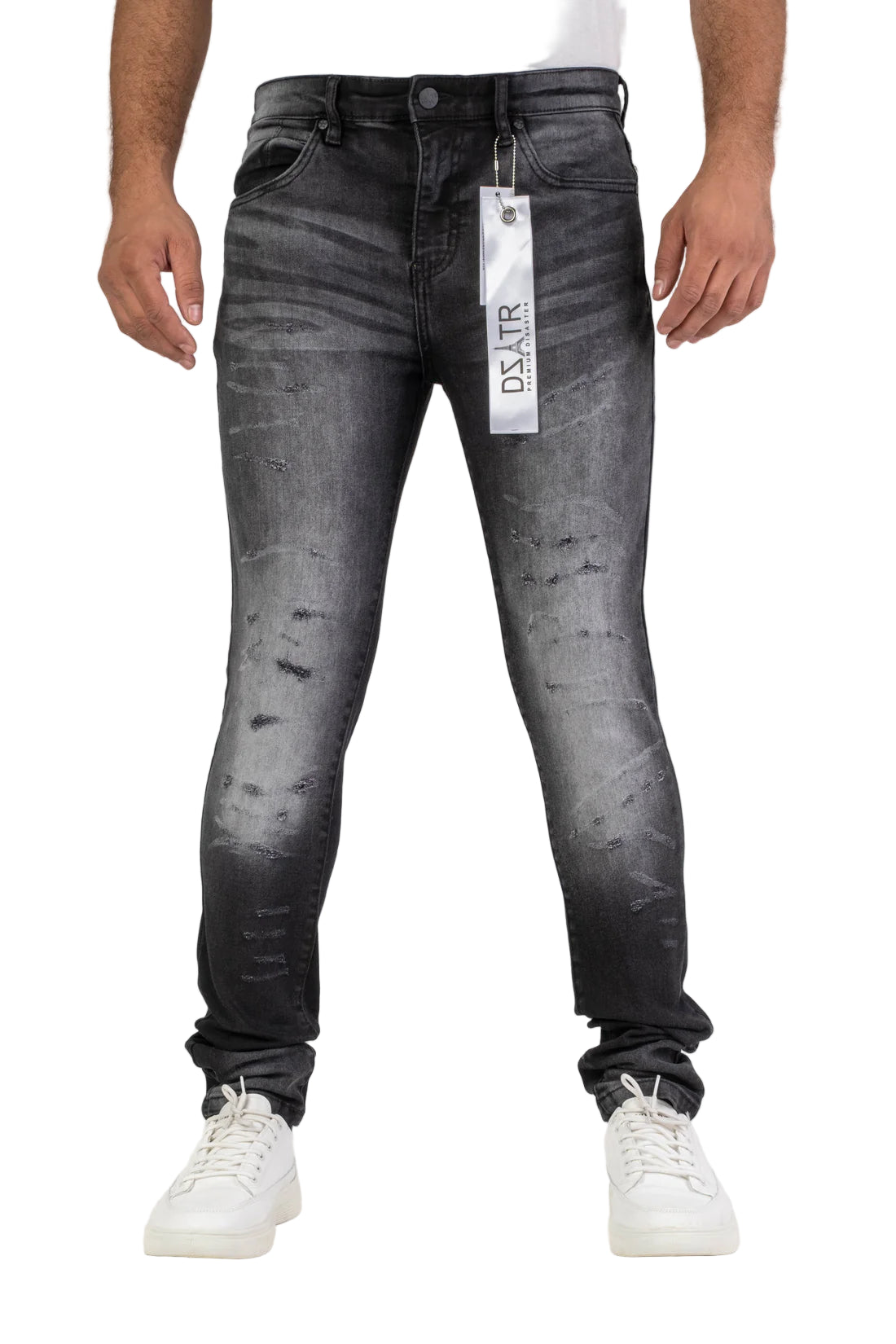 Black distressed jeans with a visible brand tag on a white background