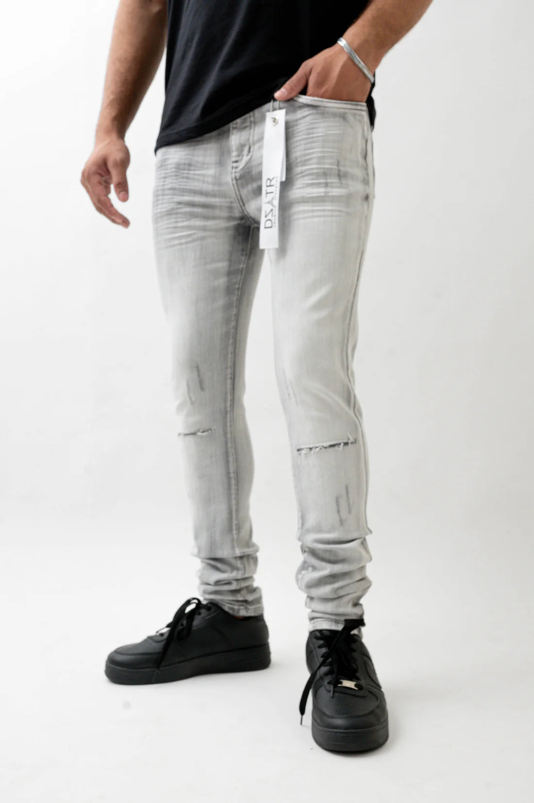 Simple never looked this good, elevate your look with The Premium Disaster's Grey Denim.

