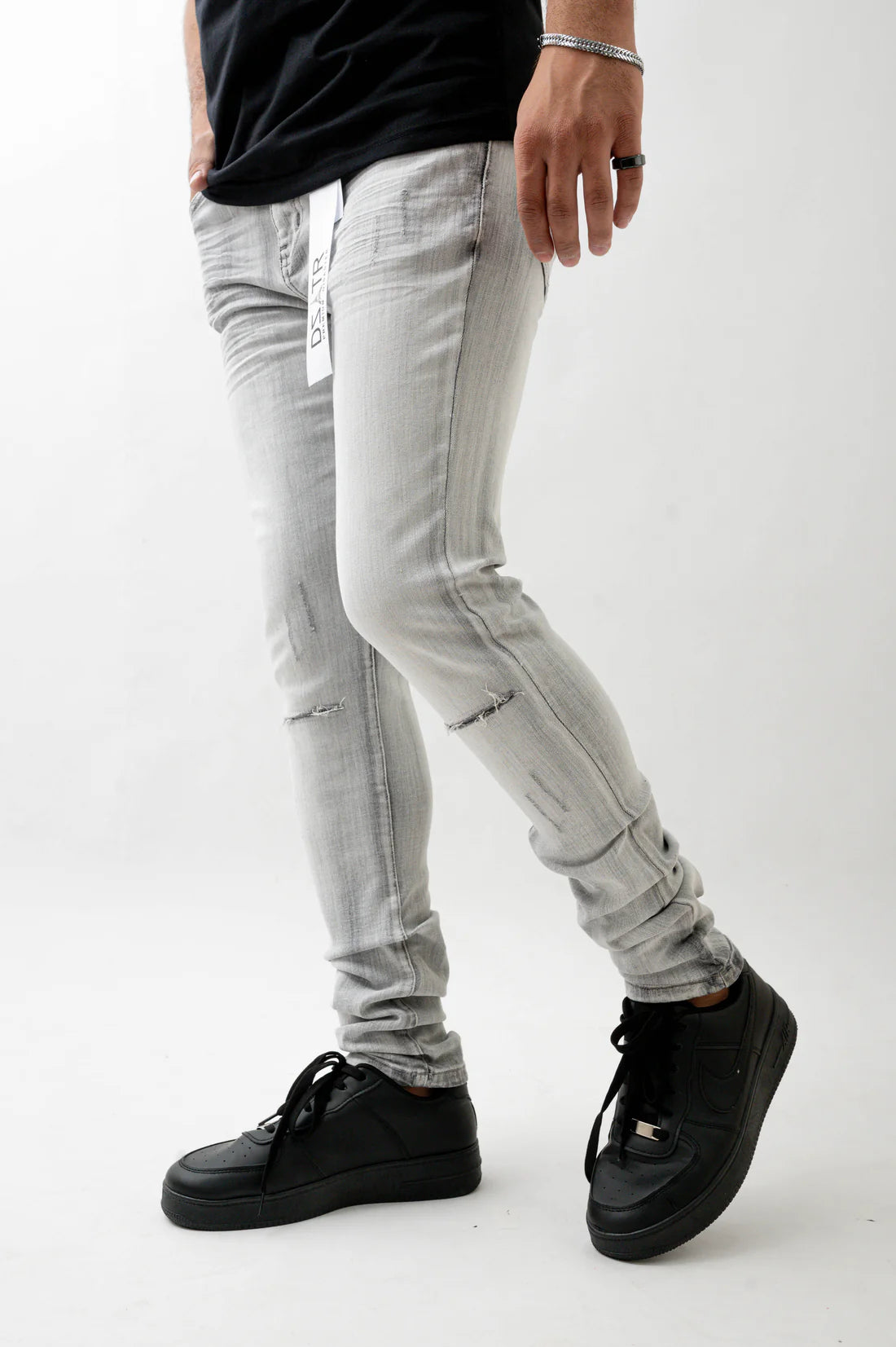 Simple never looked this good, elevate your look with The Premium Disaster's Grey Denim.

