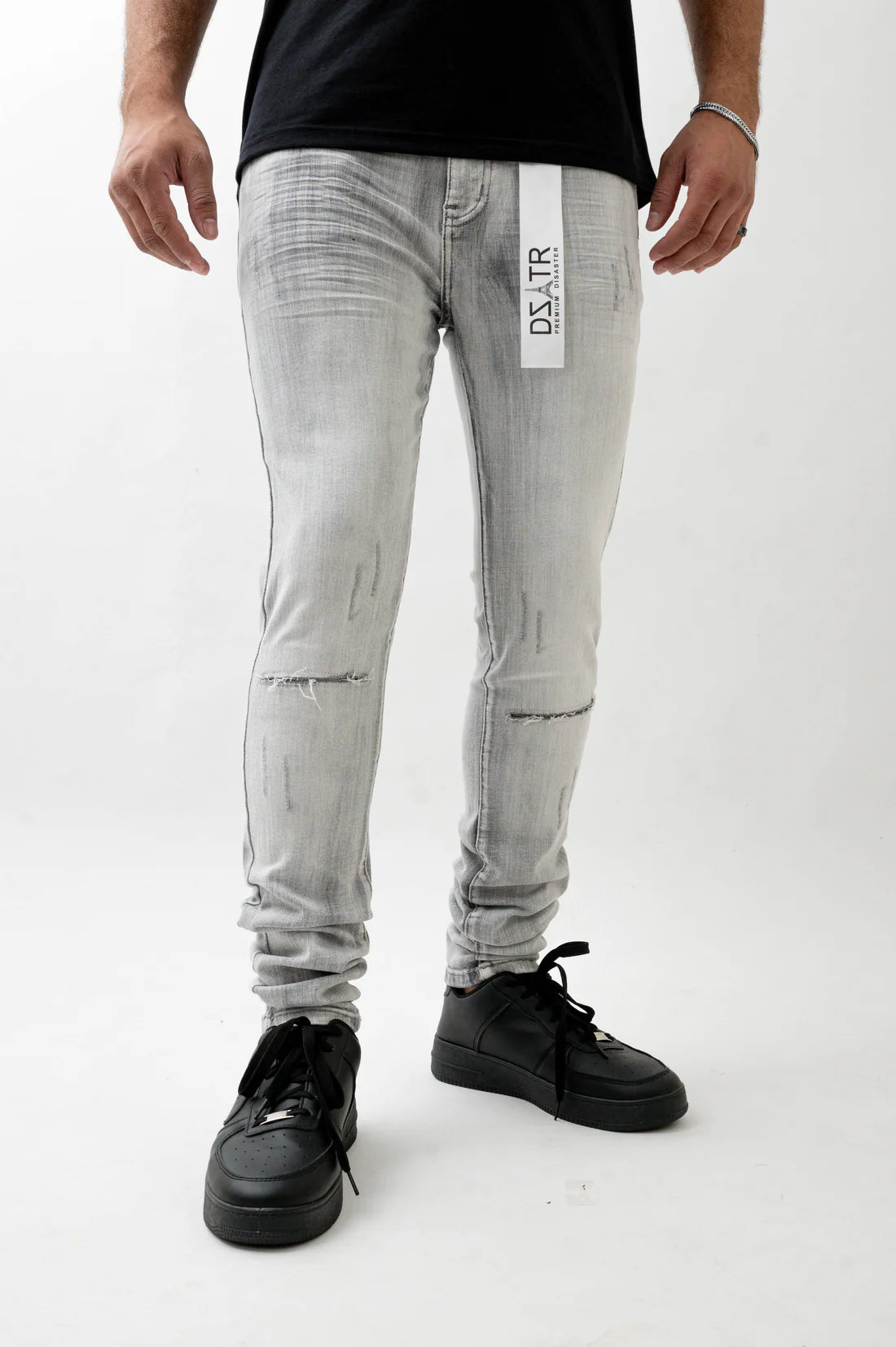 Simple never looked this good, elevate your look with The Premium Disaster's Grey Denim.

