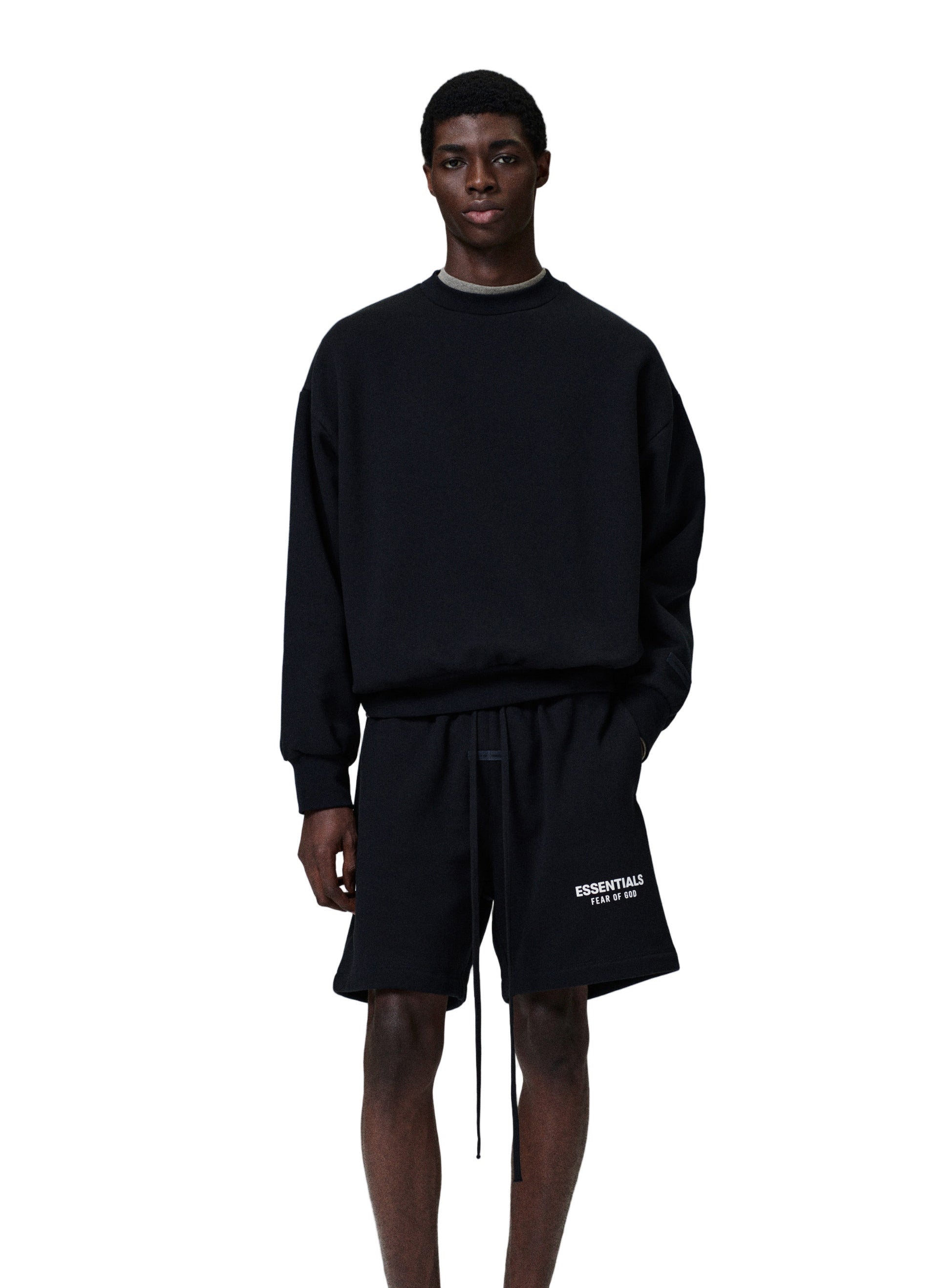 The Classic Crewneck Sweatshirt is made in heavy 380gsm core fleece to provide ideal comfort and structure. The signature "Essentials Fear of God" soft-touch logo is branded across the back. Details include a rib-knit collar, cuffs, and waist-hem. An updated Fear of God Essentials translucent rubberized label is stitched on the cuff.