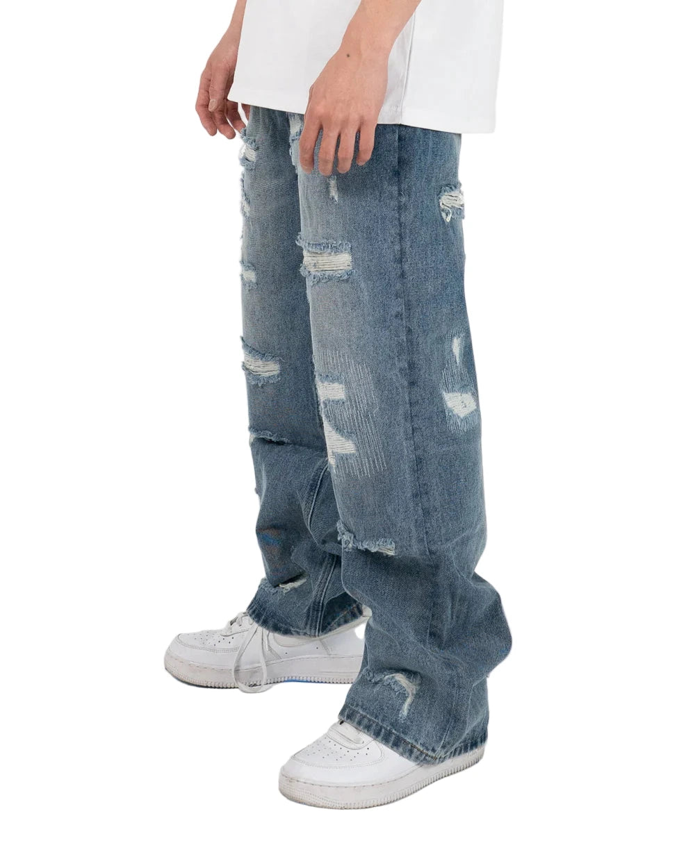 Wide fit heavyweight denim jeans with distressed details, repaired patches, and contrast cotton backing
