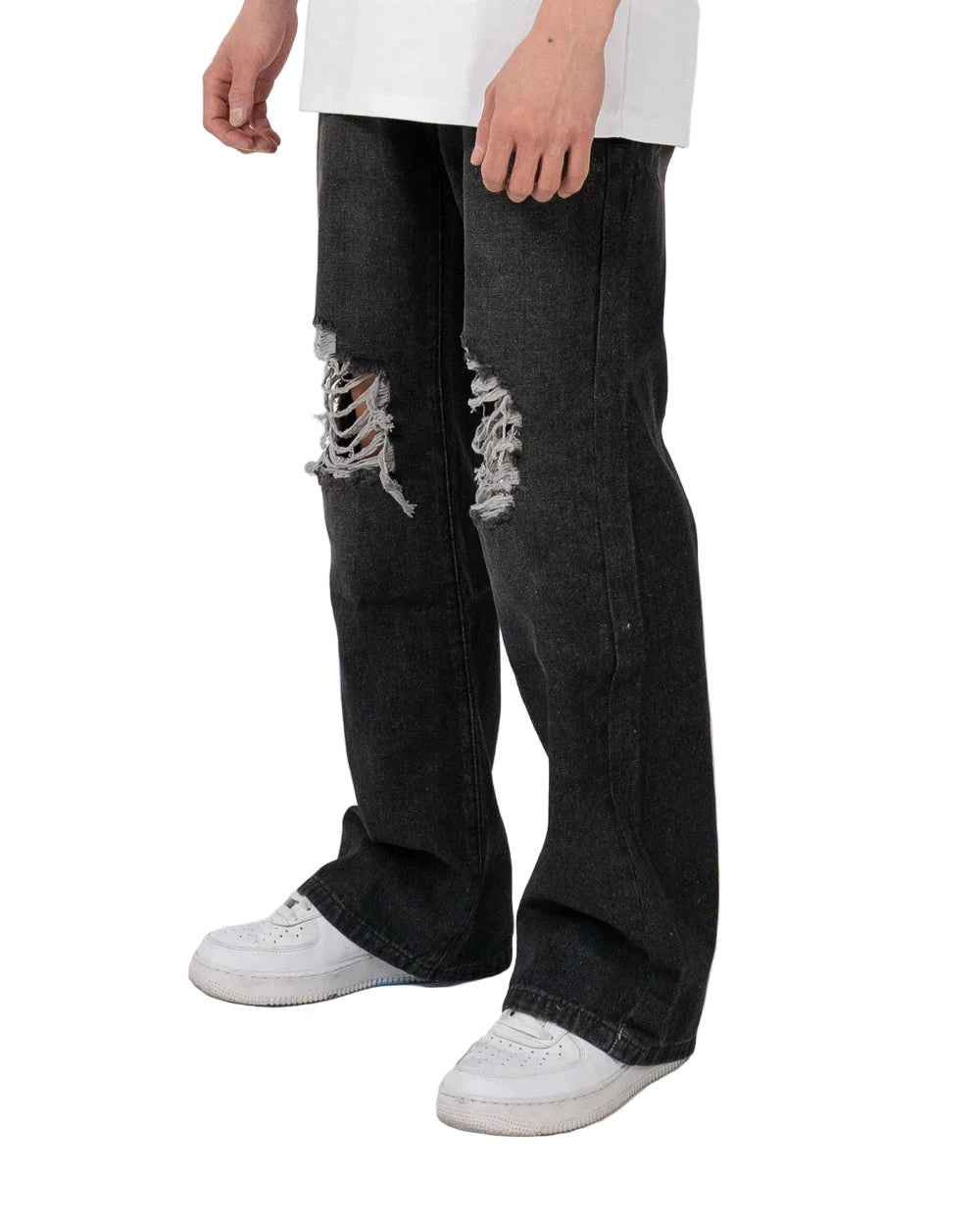 Loose fit distressed jeans in washed denim with classic five-pocket design and knee blowouts
