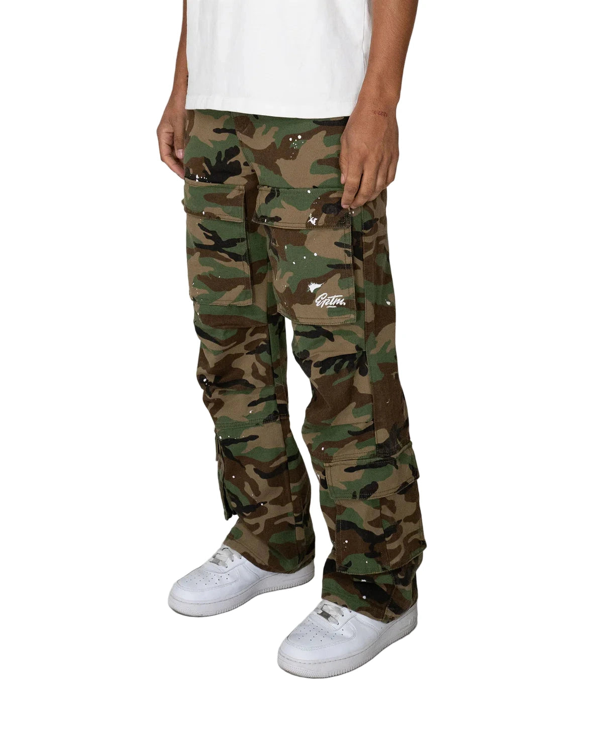 Neo Cargo Pants in printed duck canvas with relaxed fit, cargo pockets, paint splatter accents, and metal logo hardware