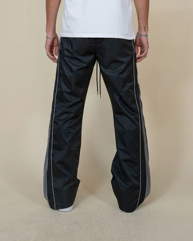 
Hidden Triple Pants with color block design, adjustable zippers, and 3M reflective piping