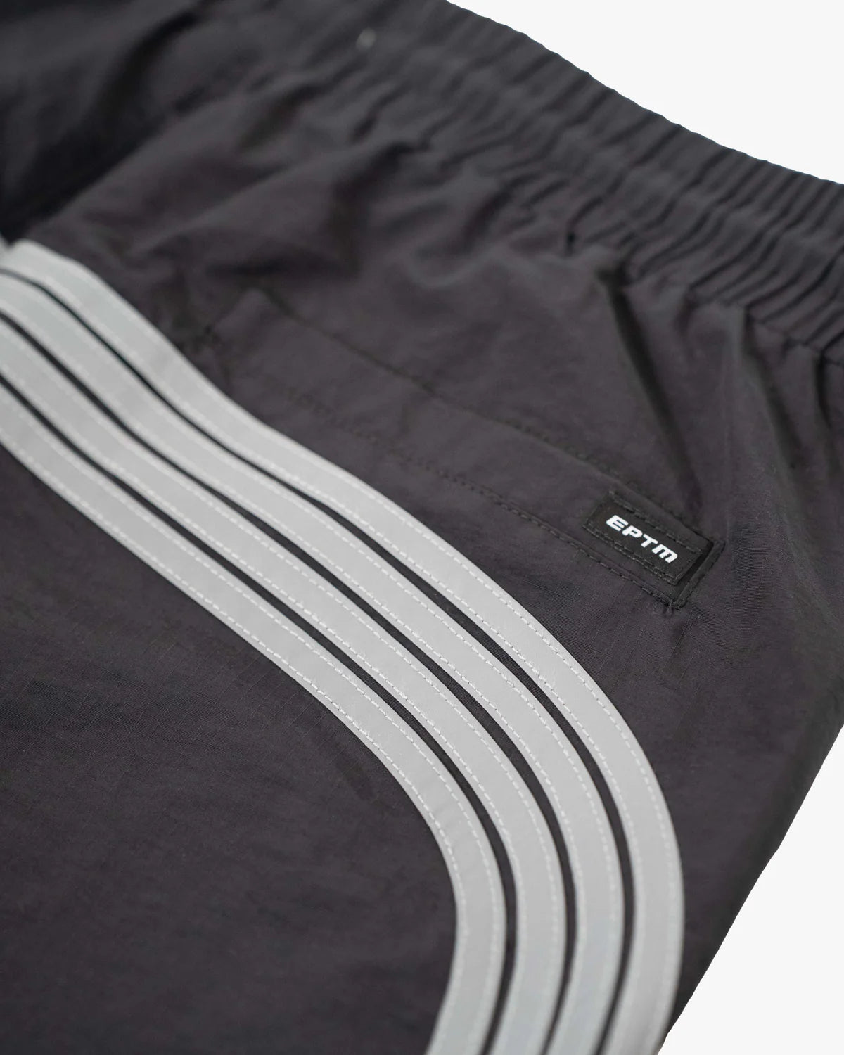 Freeway Pants with baggy fit, nylon ripstop fabric, and 3M reflective detailing with adjustable waistband