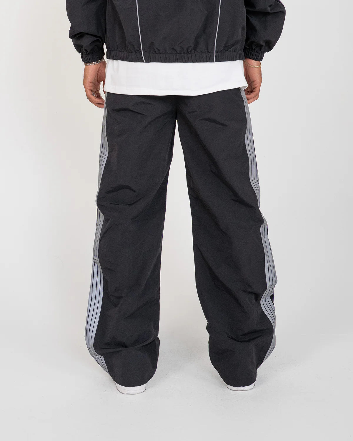 Freeway Pants with baggy fit, nylon ripstop fabric, and 3M reflective detailing with adjustable waistband