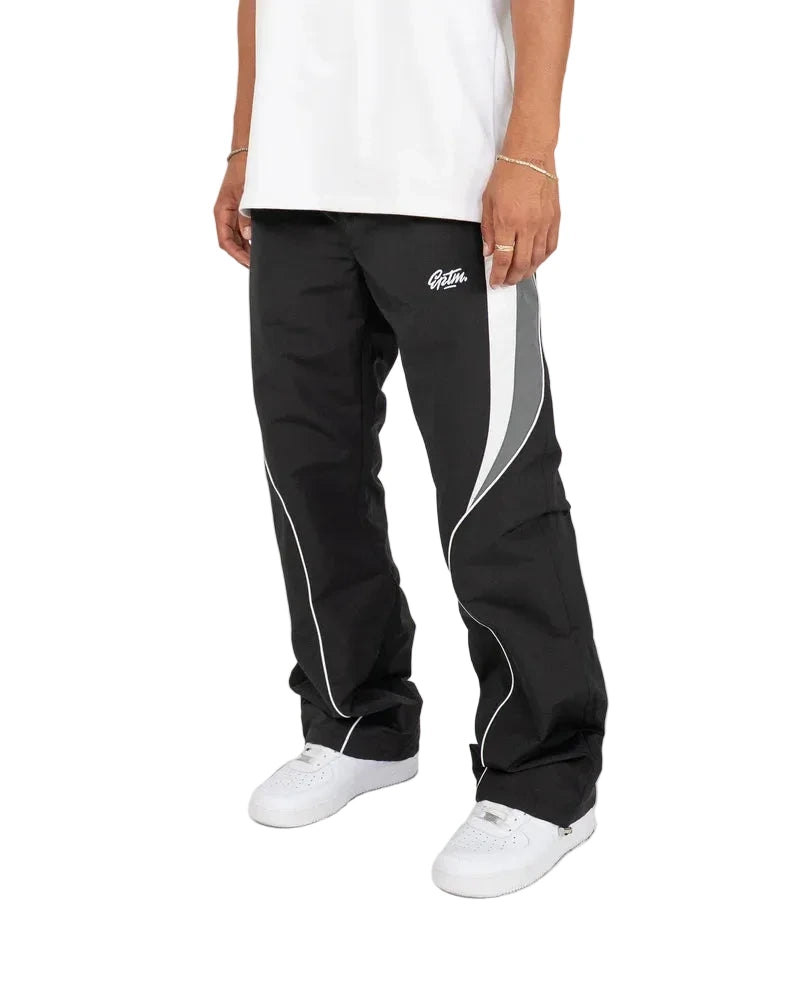 EPTM Menlo Pants in black with streamlined lines, refined piping, elastic waistband, and relaxed fit