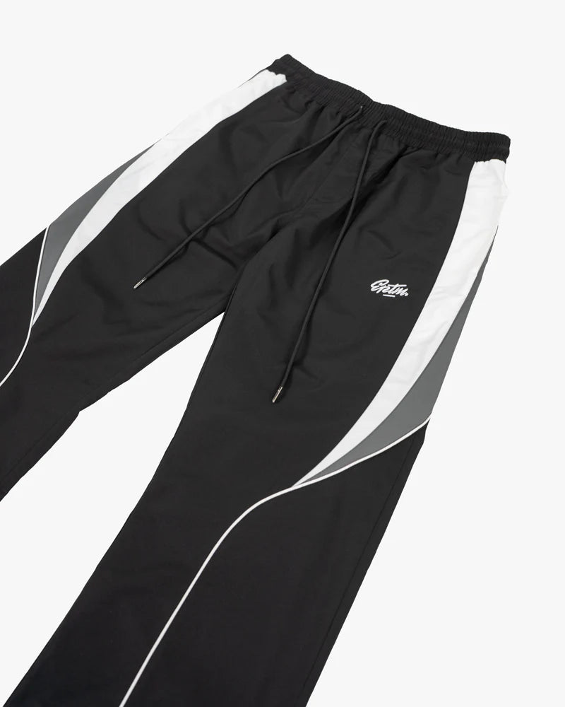 EPTM Menlo Pants in black with streamlined lines, refined piping, elastic waistband, and relaxed fit