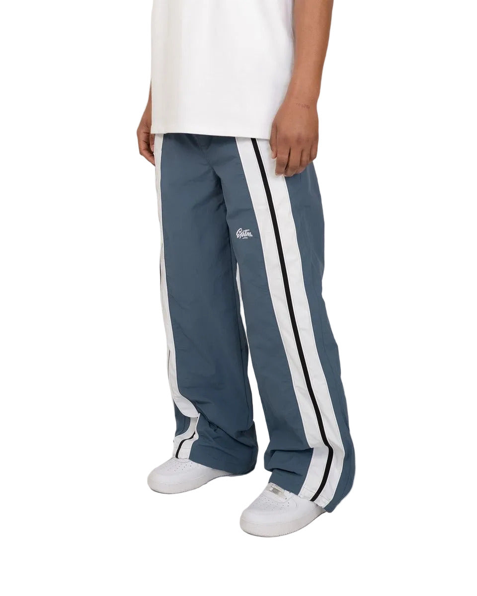 EPTM Catalina pants with bold color-block design, piping details, and lightweight nylon ripstop fabric for modern streetwear style