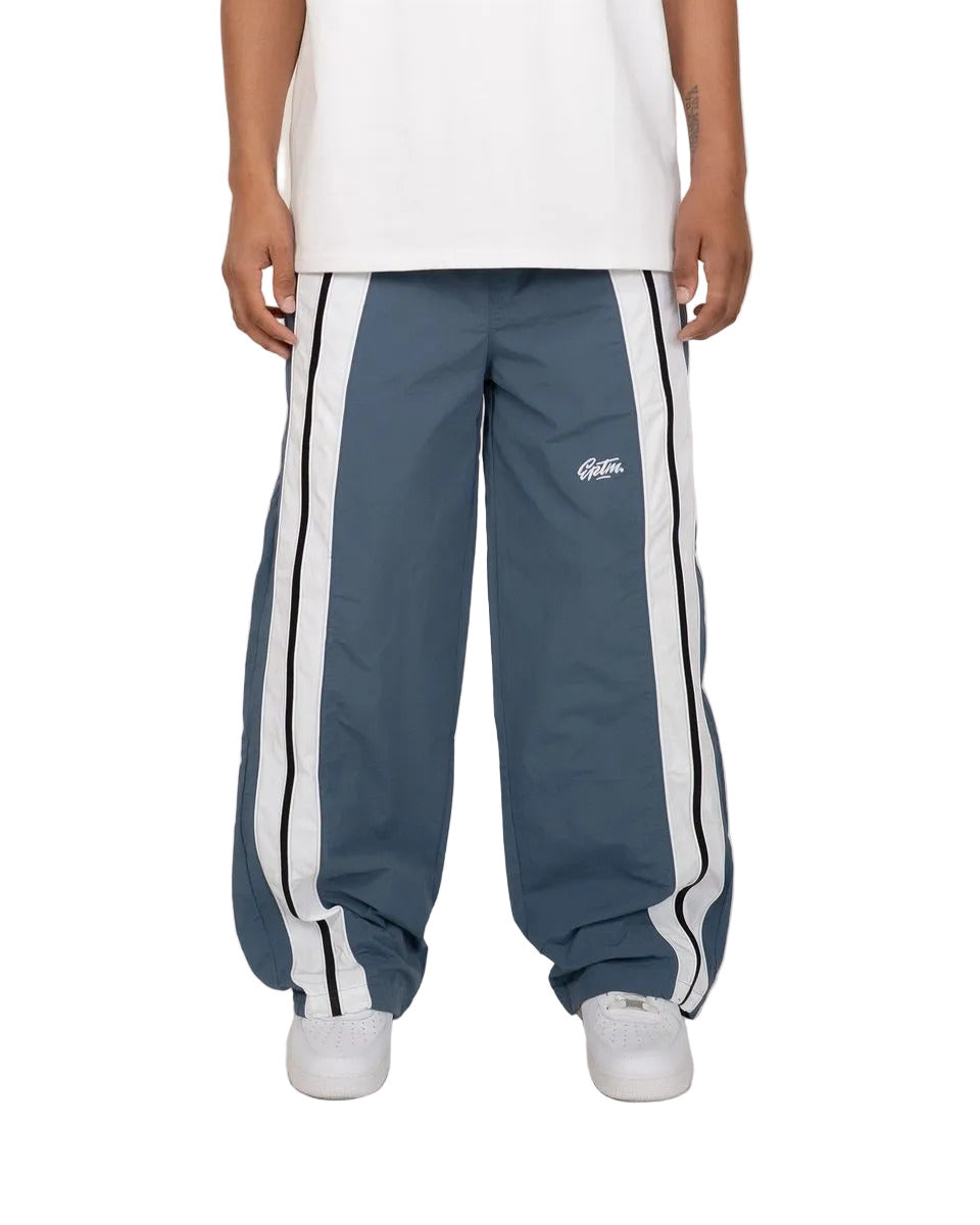 EPTM Catalina pants with bold color-block design, piping details, and lightweight nylon ripstop fabric for modern streetwear style