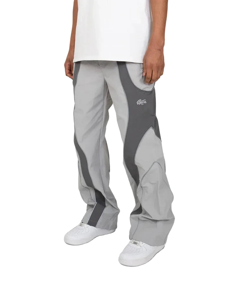 EPTM Era Pants in grey made from nylon ripstop with 3M reflective piping, elastic waistband, and relaxed fit