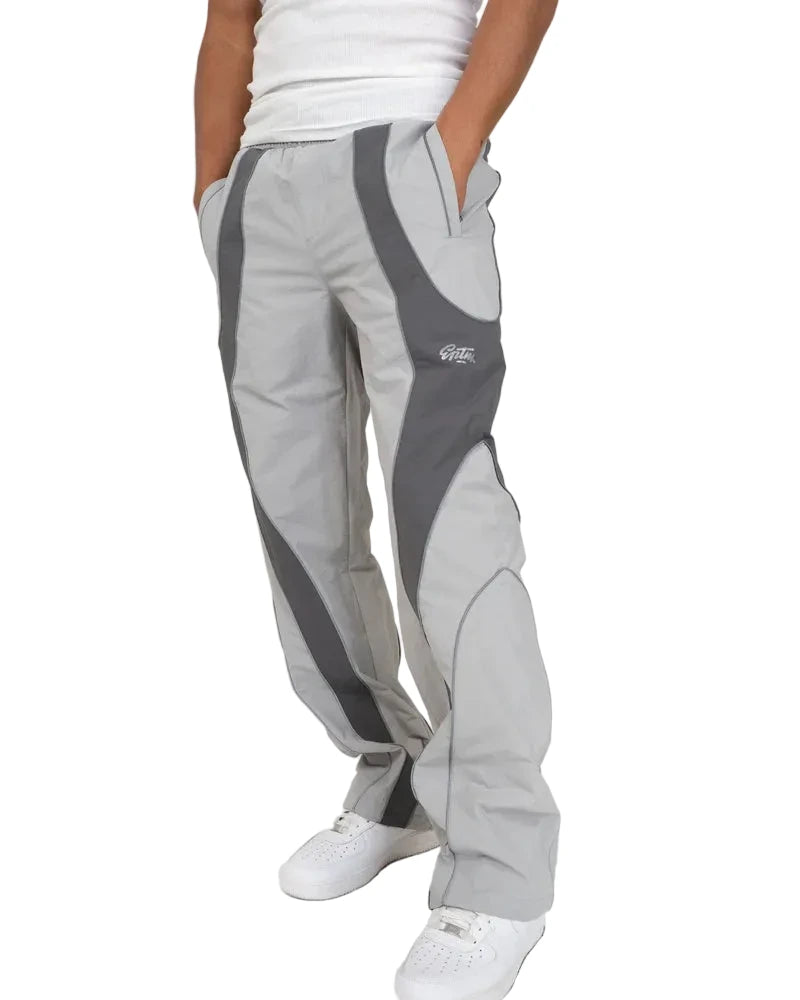 EPTM Era Pants in grey made from nylon ripstop with 3M reflective piping, elastic waistband, and relaxed fit