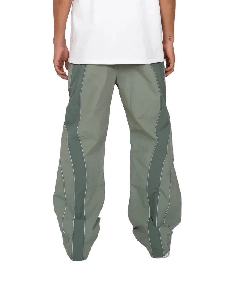 EPTM Era Pants in sage made from nylon ripstop with 3M reflective piping, elastic waistband, and relaxed fit